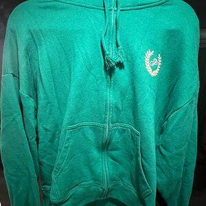 Victoria's Secret green Zip-Up Sweater with Embroidered Crest